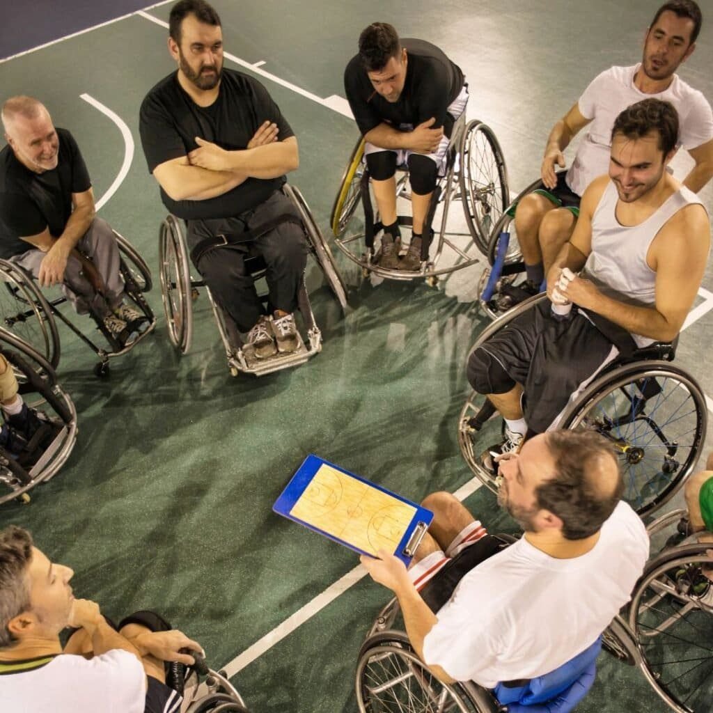 group of wheelchair bound men hosting a fundraiser